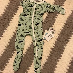 6-9 months footie. Took tags off and wore once